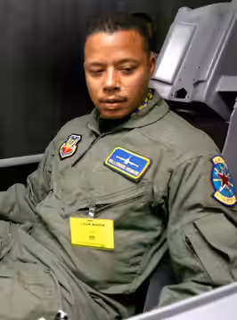 United States actor Terrence Howard receiving instruction in an F-16 Fighting Falcon simulator to help prepare him for his role in the movie "Iron Man".