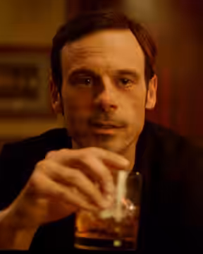 Scoot McNairy in a 2022 ad for TX Whiskey