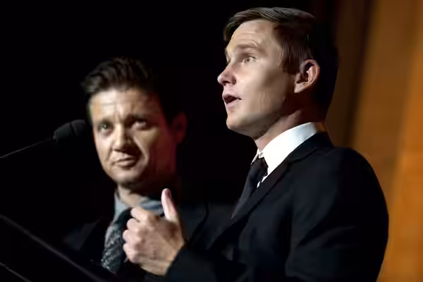 The Hurt Locker actors Jeremy Renner, left, and Brian Geraghty addresses the audience at the annual Tragedy Assistance Program for Survivors Gala in Washington, (2010)