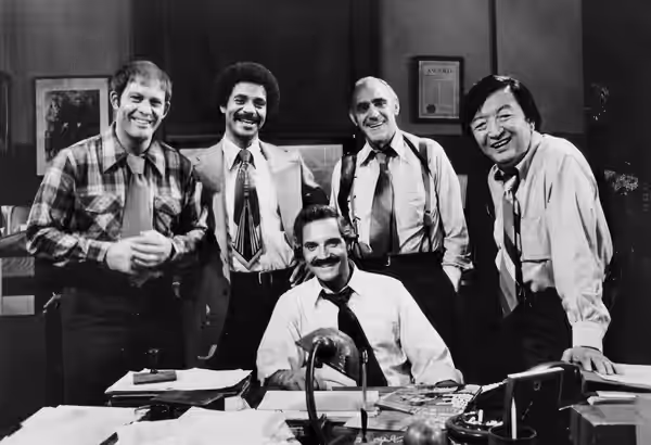 1977 cast photo from the television series Barney Miller. From left: Max Gail ("Wojo" Wojciehowicz}, Ron Glass (Ron Harris}, Abe Vigoda (Phil Fish), Jack Soo (N