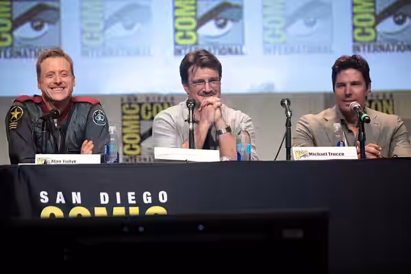 Alan Tudyk, Nathan Fillion and Michael Trucco speaking at the 2015 San Diego Comic Con International, for "Con Man", at the San Diego Convention Center in San D