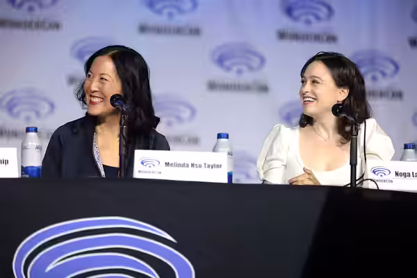 Melinda Hsu Taylor and Noga Landau speaking at the 2022 WonderCon, for "TV Guide Magazine’s 2022 Fan Favorites: Warner Bros. Television Showrunners Edition", at