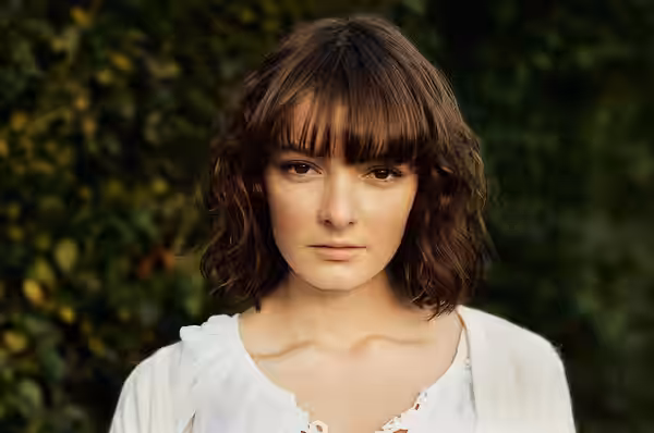 Portrait photograph of Dakota Blue Richards, photographed in 2012.