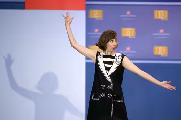 Comedian Kristen Schaal performs during the comedy show in celebration of the 75th anniversary of the USO and the 5th anniversary of Joining Forces at Joint Bas (2016)