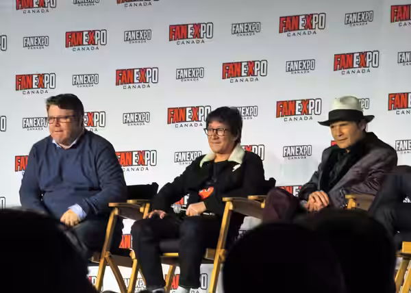 Sean Astin, Ke Huy Quan, and Corey Feldman at the Goonies Panel, 2019 Fan Expo Toronto