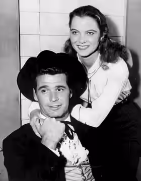 Photo of James Garner as Bret Maverick and guest star Louise Fletcher from the television program Maverick. (1959)