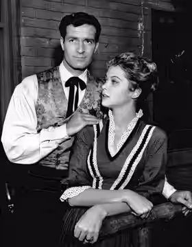 Photo of Hugh O'Brian as Wyatt Earp and guest star Louise Fletcher from the television program The Life and Legend of Wyatt Earp. (1961)