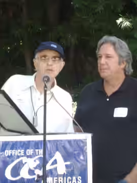Cole Miller (right) receives award from Haskell Wexler (left) at annual Office of the Americas event (2008)