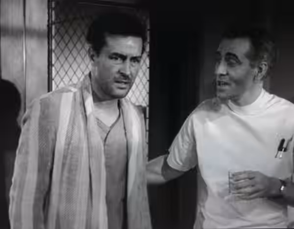 Screenshot with Ray Milland from the trailer for the American film The Lost Weekend (1945) by Billy Wilder. Ray Milland, Frank Faylen