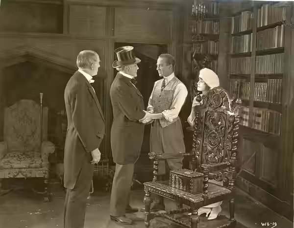 A scene from the American comedy drama film Haunting Shadows which played at the Colonial Theater, Seattle. Includes H. B. Warner. Date stamped Mar. 25, 1920. S