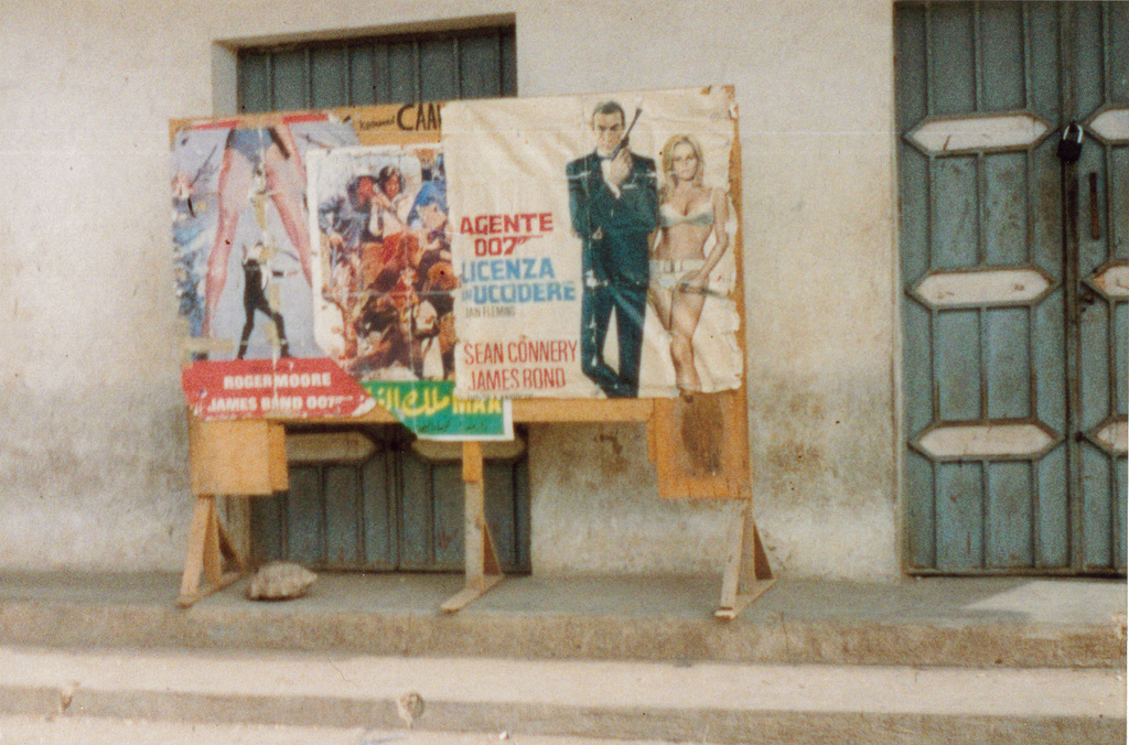 Old James Bond posters on a street corner in Somalia. (2011)