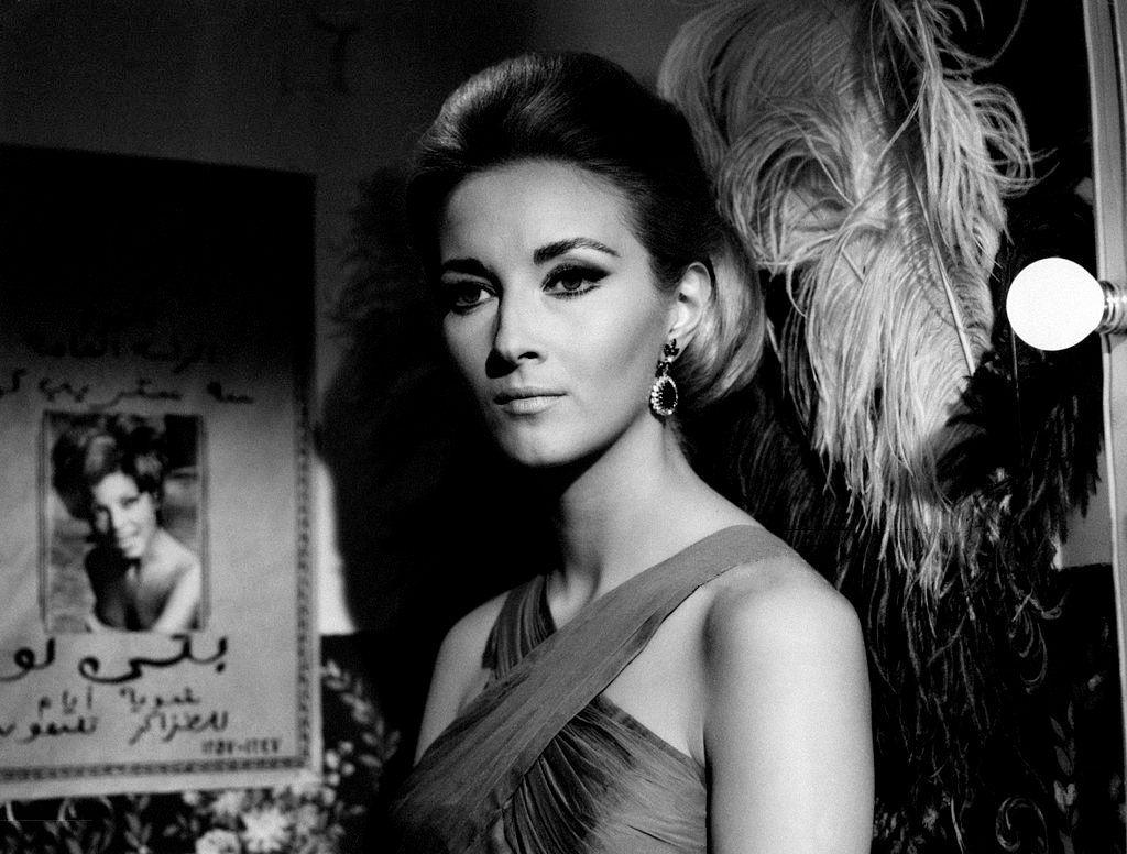 Italian actress and model Daniela Bianchi wearing an evening dress in the film Requiem for a Secret Agent, 1966.