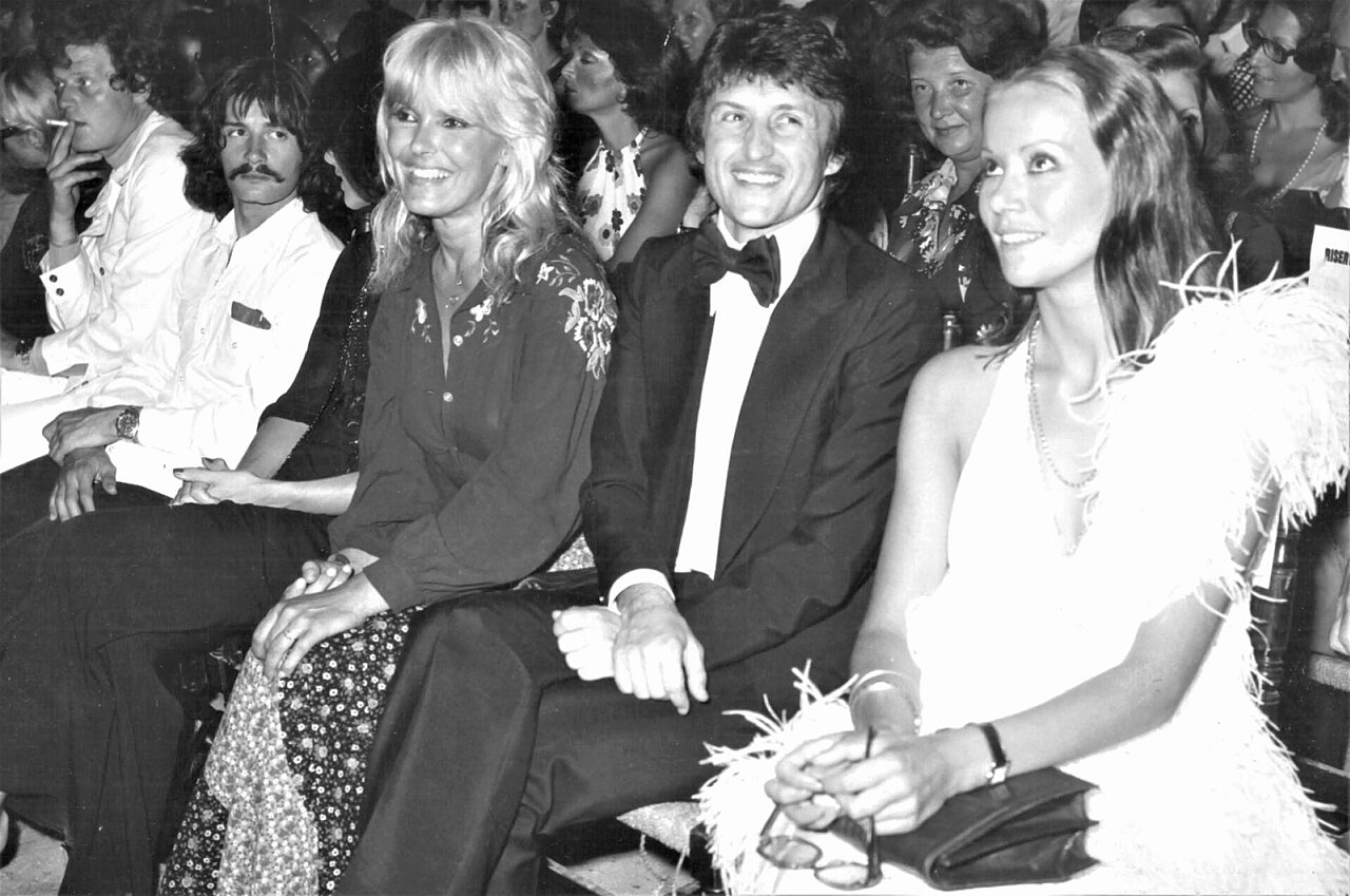 Photograph of movie people at Taormina Film Festival, prize seremony. From the right: Claudine Auger, Tony Renis, and Sabine Sun.