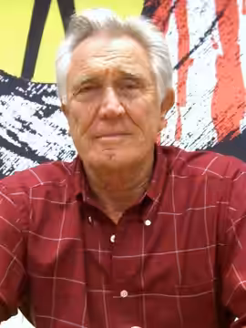 Actor George Lazenby at the November 2008 Big Apple Convention in Manhattan. This photo was created by Luigi Novi. It is not in the public domain, and use of th