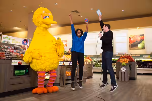 First Lady Michelle Obama participates in a "Let's Move!" Funny or Die game show taping with Billy Eichner of Billy on the Street, and Big Bird at Safeway in Wa