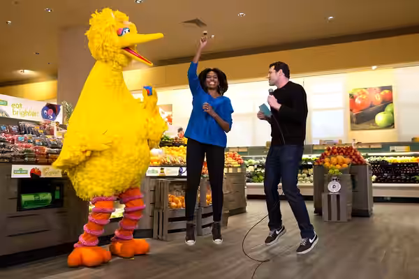 First Lady Michelle Obama participates in a "Let's Move!" Funny or Die game show taping with Billy Eichner of Billy on the Street and Big Bird at Safeway in Was (2015)