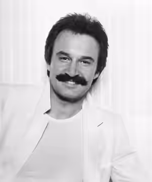 Italian music producer Giorgio Moroder in 1979, in a publicity photo by Casablanca Records promoting his album E=MC².
