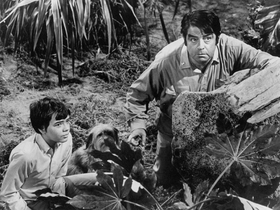 Publicity photo of television actors Stefan Arngrim and Kurt Kasznar promoting their roles on the television series Land of the Giants.