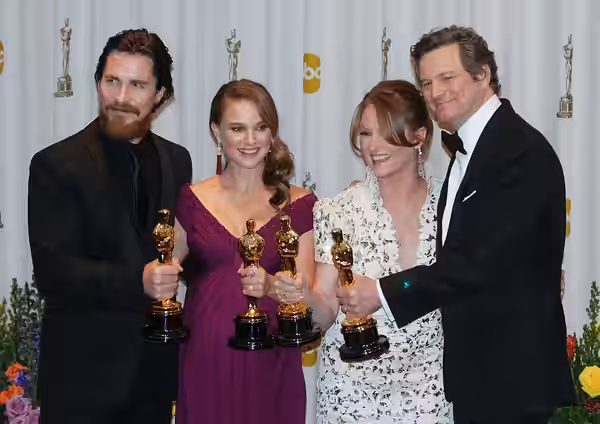 Oscar winners (from left to right) Christian Bale, Natalie Portman, Melissa Leo and Colin Firth pose with their Oscars backstage at the 83rd Academy Awards Feb. (2011)