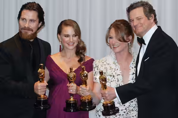 Oscar winners (from left to right) Christian Bale, Natalie Portman, Melissa Leo and Colin Firth pose with their Oscars backstage at the 83rd Academy Awards Febr (2011)