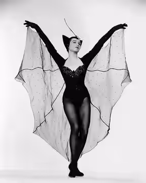 Shirley Maclaine dressed as a bat in Artists and Models (1955).