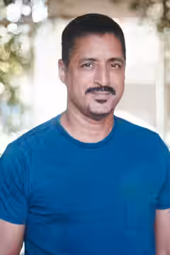 Actor Kirk Taylor in Blue Shirt (2020)