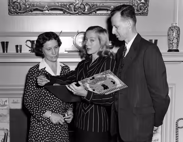 Photograph of a formal presentation of Daisy Suckley's The Story of Fala (audio version) which took place in the President's private study at the FDR Presidenti (1946)