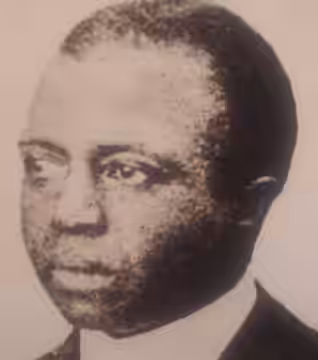 Billy Hathorn took this photo of a photo of Scott Joplin at Finney County, KS, Historical Museum in Garden City, KS, with Canon camera. This precedes 1923.