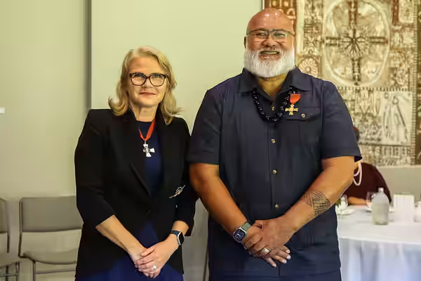 David Fane (right), after his investiture as ONZM, for services to the performing arts, by the administrator of the government, Dame Helen Winkelmann, at Govern (2023)