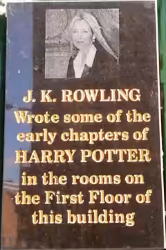 The J.K.Rowling plaque on the corner of the former Nicholson's Cafe (now named Spoon) is at 6A Nicolson St, Edinburgh. The cafe is on the 1st floor and is where (2020)
