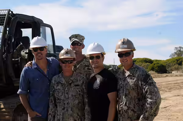 Scooby-Doo" actor Matthew Lillard and "The Good Wife" actor Josh Charles pose with Naval Mobile Construction Battalion 133 Detail Rota Seabees, Equipment Operat (2014)