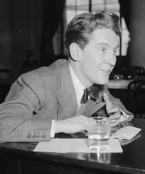 Burgess Meredith urging for a permanent Federal Bureau of Fine Arts in Washington, D.C. on February 28, 1938. A militant campaign will shortly be waged for crea