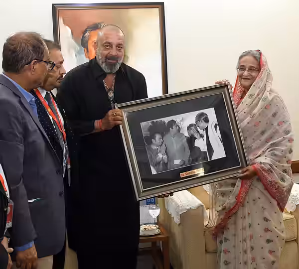 Bollywood actor Sanjay Dutt handed over several photographs taken with India's cultural delegation and Bangabandhu Sheikh Mujibur Rahman in 1972 to Prime Minist
