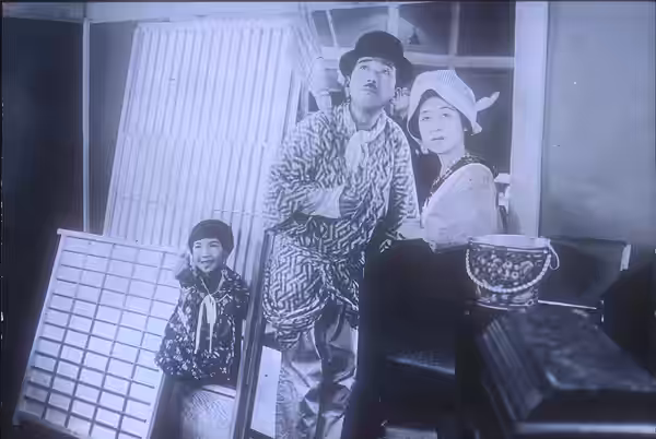 Description: Low-resolution reproduction of screenshot from the movie Madamu to nyobo (The Neighbor's Wife and Mine; 1931), featuring actors Mitsuko Ichimura, A