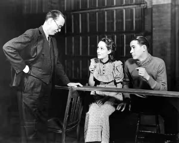 Photograph of Frank Craven, Martha Scott and John Craven in the original Broadway production of Our Town Snipe on reverse side reads as follows:SCENE FROM 1938 