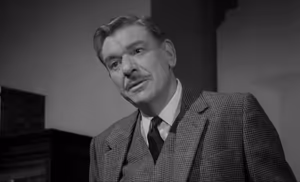 Screenshot from the trailer of Cash On Demand (1961)