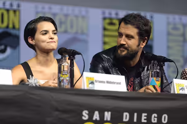 Brianna Hildebrand and Stefan Kapičić speaking at the 2018 San Diego Comic Con International, for "Deadpool 2", at the San Diego Convention Center in San Diego,