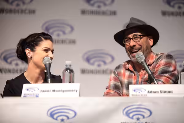 Janet Montgomery and Adam Simon speaking at the 2015 Wondercon, for "Salem", at the Anaheim Convention Center in Anaheim, California. Please attribute to Gage S