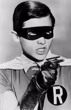 Composite photo of Burt Ward as Robin and introducing Yvonne Craig as Batgirl from the television series Batman.