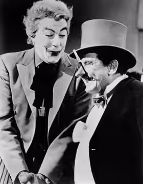 Photo of Cesar Romero as The Joker and Burgess Meredith as The Penguin from the television program Batman. (1967)