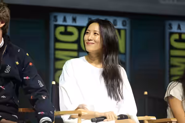 Claudia Kim speaking at the 2018 San Diego Comic Con International, for "Fantastic Beasts: The Crimes of Grindelwald", at the San Diego Convention Center in San
