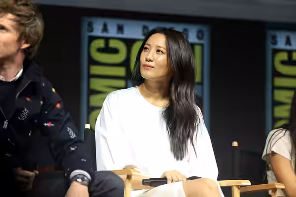 Claudia Kim speaking at the 2018 San Diego Comic Con International, for "Fantastic Beasts: The Crimes of Grindelwald", at the San Diego Convention Center in San