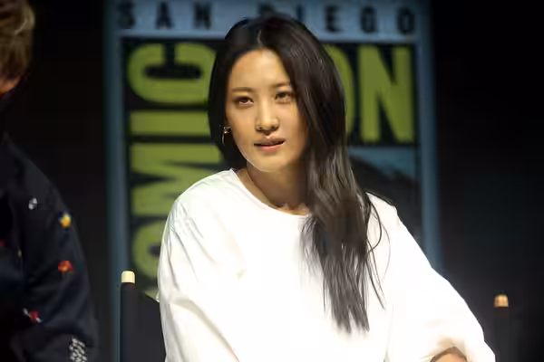 Claudia Kim speaking at the 2018 San Diego Comic Con International, for "Fantastic Beasts: The Crimes of Grindelwald", at the San Diego Convention Center in San