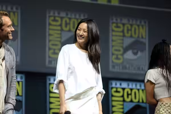 Claudia Kim speaking at the 2018 San Diego Comic Con International, for "Fantastic Beasts: The Crimes of Grindelwald", at the San Diego Convention Center in San