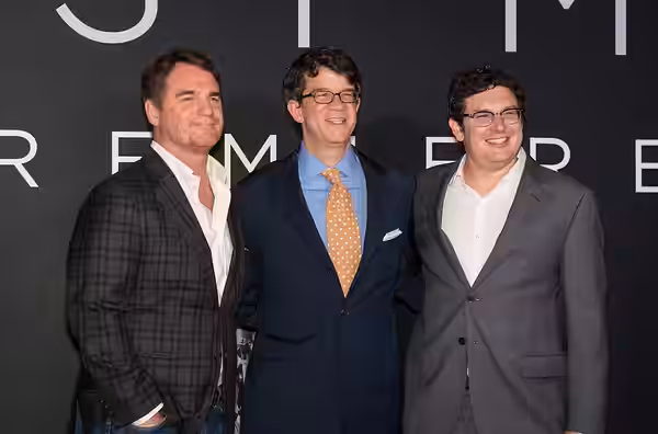From left to right, producers Marty Bowen, Wyck Godfrey, and Isaac Klausner attend the premiere of Universal's feature film "First Man” Thursday, Oct. 4, 2018 a