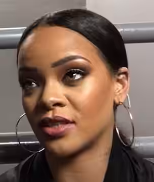 Rihanna interviewed by Tai Lopez while behind the scenes of a show she is performing (2016)