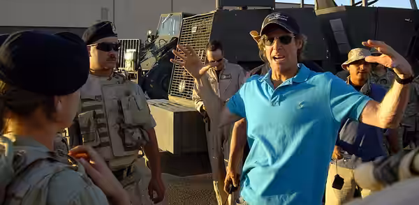 Movie director Michael Bay instructs Airmen filling the roles of extras on the set of the movie "Transformers" at Holloman Air Force Base, N.M., on Tuesday, May (2006)