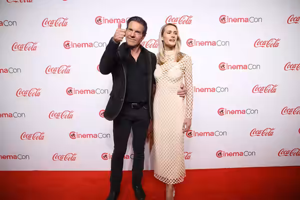 Dennis Quaid and his wife, Laura Savoie, on the red carpet at the Big Screen Achievement Awards at the 2024 CinemaCon at The Colosseum Theater at Caesars Palace