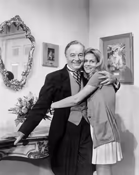 Photo of Maurice Evans as Samantha's Dad, Maurice and Elizabeth Montgomery as Samantha from Bewitched. The family takes a trip to Paris in this episode.