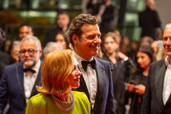 Isabelle Huppert and Laurent Lafitt at 2025 Cannes Red Carpet for The Richest Woman in the World